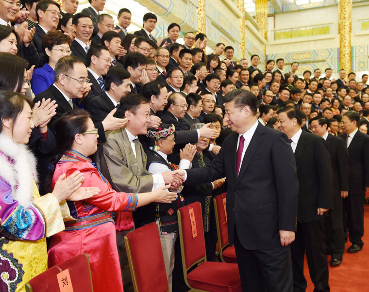 习近平会见中国新闻奖、长江韬奋奖获奖者代表