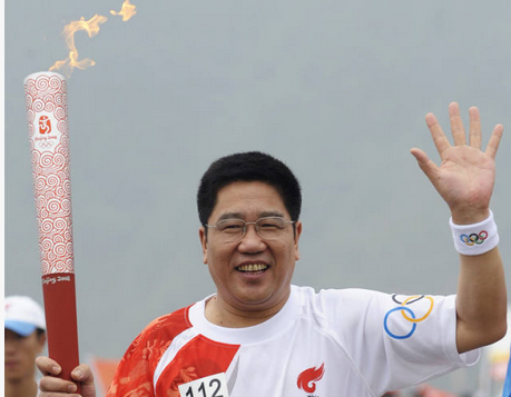 四任火炬手：一个体育老记的奥运情缘