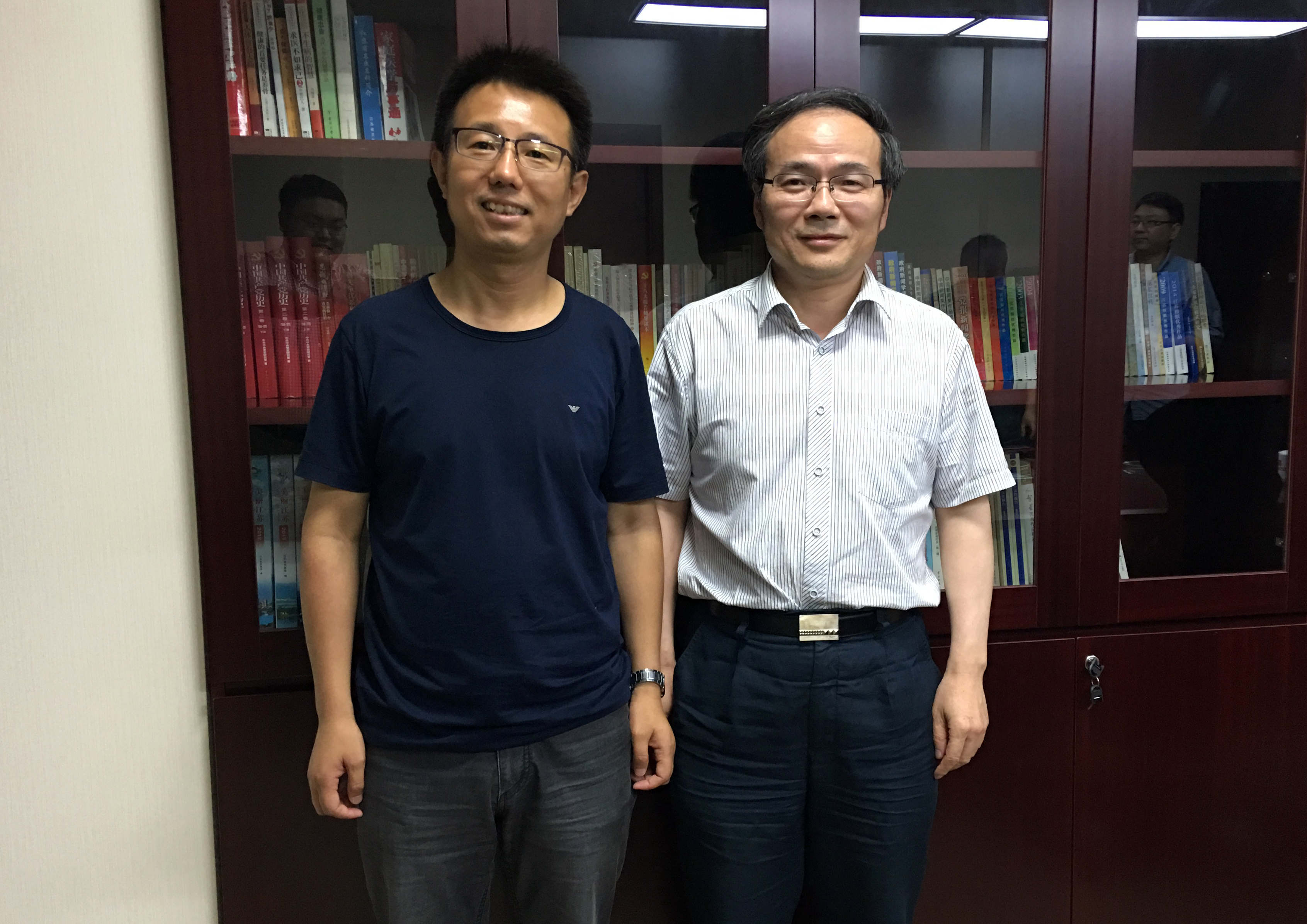 观媒主笔赵治国拜访新华报业传媒集团社长周跃敏