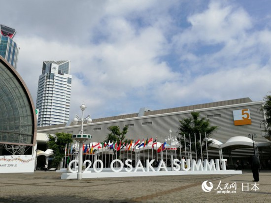 G20大阪峰会首日：媒体中心里的媒体人